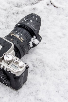 фотоаппарат на снегу